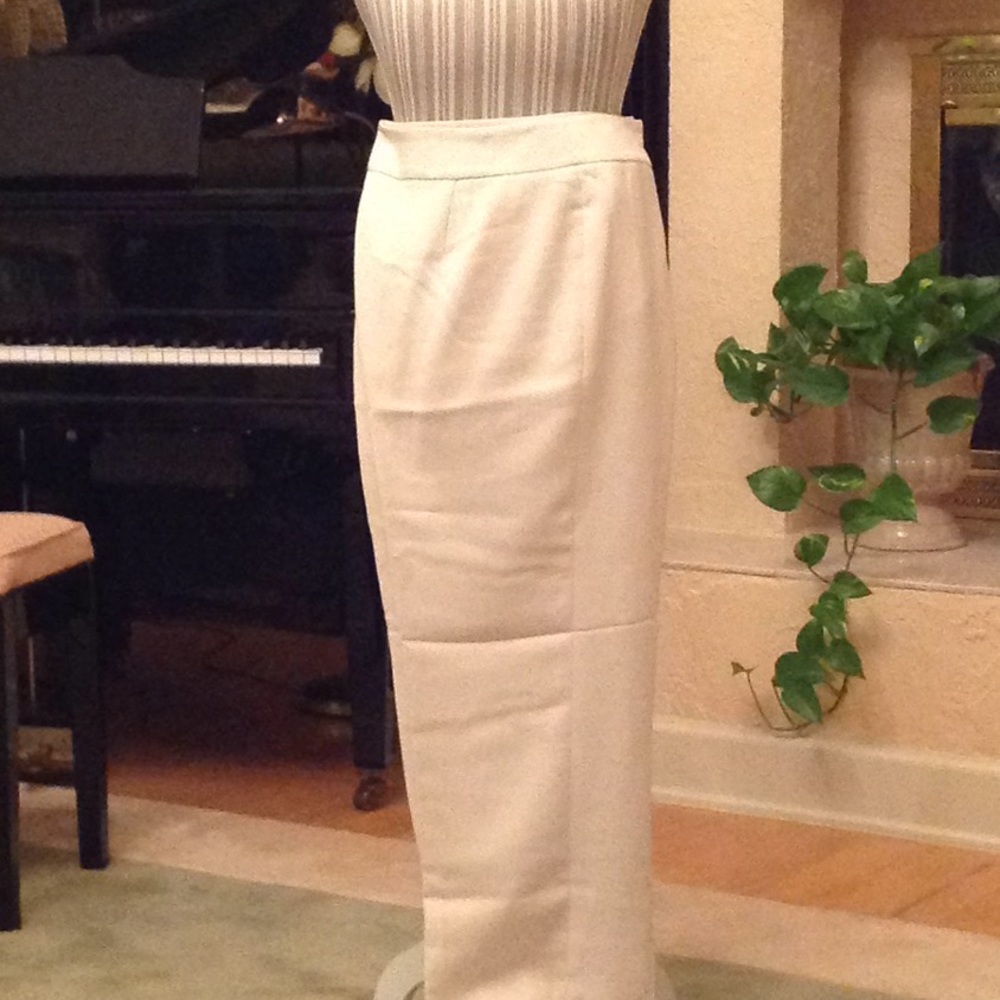 Cream colored slacks.
